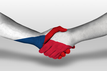 Handshake between poland and czech republic flags painted on hands, illustration with clipping path.