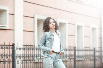 black curly girl on street