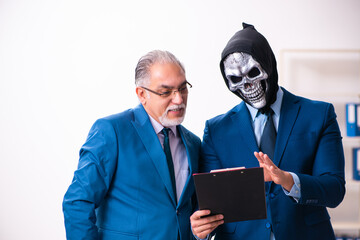 Old businessman employee getting deal with the devil