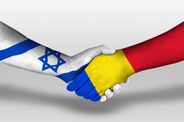 Handshake between romania and israel flags painted on hands, illustration with clipping path.