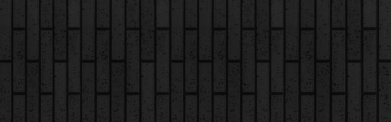 Panorama of Black stone block wall seamless background and pattern texture