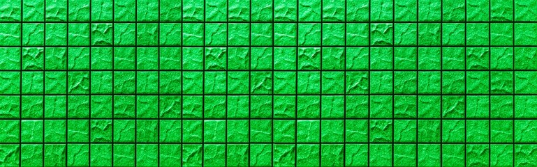 Panorama of Green mosaic wall tile pattern and seamless background