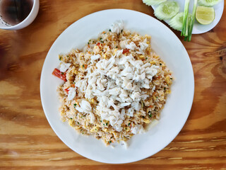 Crab fried rice on a white plate