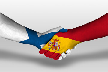 Handshake between spain and finland flags painted on hands, illustration with clipping path.
