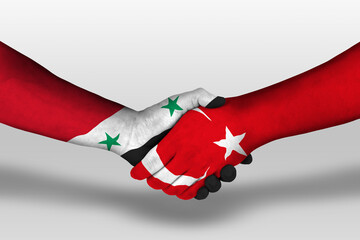 Handshake between turkey and syria flags painted on hands, illustration with clipping path.