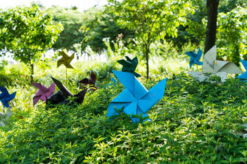Colorful windmill decoration in the grasses