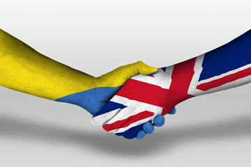 Handshake between united kingdom and ukraine flags painted on hands, illustration with clipping path.