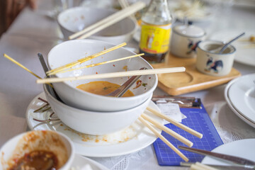 Food containers that were piled up after eating at lunch