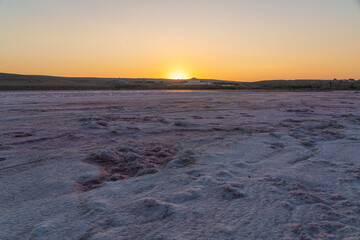Dried up salt lake at sunrise