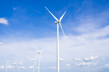 The wind turbines used to generate electricity provide clean energy to the earth on clear days