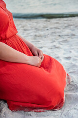 Woman on sandy coast.