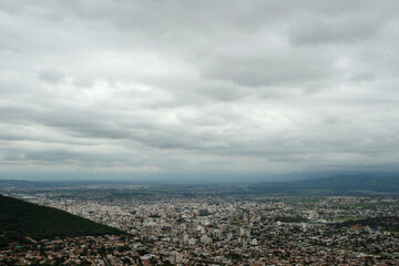 Urban texture. Aerial view of the city at the foot of the mountain.	