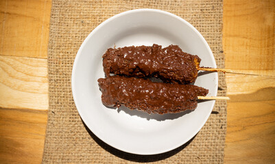 Banana coasted by chocolate which is very sweet