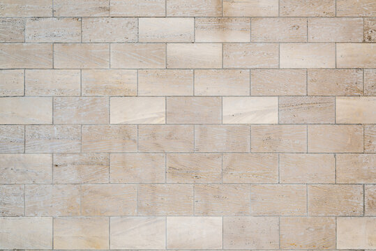 Textur einer Stein Wand. Material f&uuml;r Wand, Boden oder Hintergrund. Stein, Natursteinstein, Travertin, Steinwand, Sandstein.
