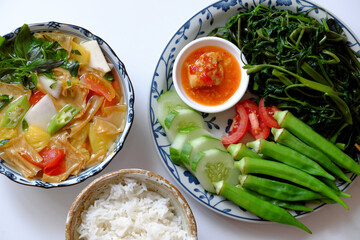vegan daily meal for lunch time, boiled okra, water spinach, cucumber with tofu cheese, rice bowl, vegetables soup, simple vegetarian healthy diet