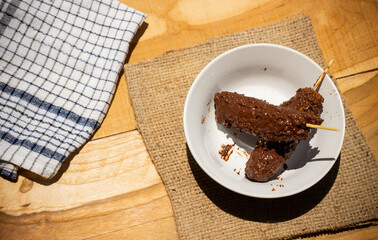 Banana coasted by chocolate which is very sweet