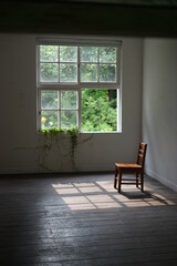 empty room with wooden chair