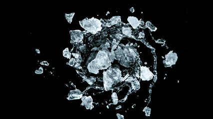 Crushed ice in motion, isolated on black background.