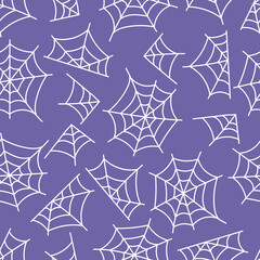 Vector seamless pattern with spiders web on purple background. Illustration for Halloween, ideal for print on fabrics, wallpapers and scrapbooking.