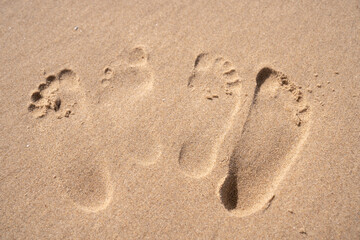 Fototapeta na wymiar Fußabdrücke im Sand 4. Footprint in sand