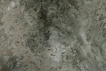 Dark concrete texture with color gradient.