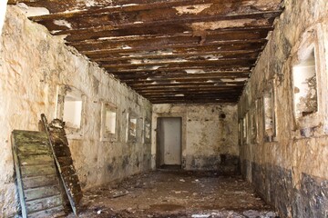 Abandoned fortress Kabala in Montenegro. Old stone empty room with windows.