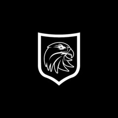 Eagle shield, eagle head logo isolated on dark background