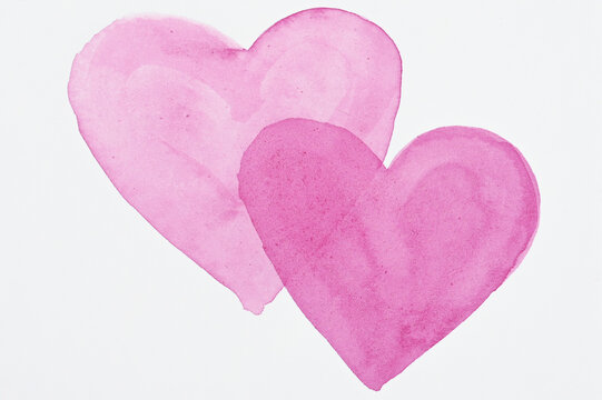 Watercolour pink painted textured hearts