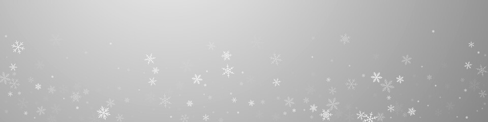 Sparse snowfall Christmas background. Subtle flyin