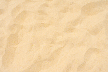 Fototapeta na wymiar Close up of Sand texture in summer sun