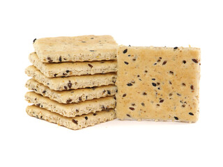 Stack of seed crackers isolated on white