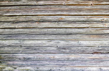 wooden log wall of an ancient house