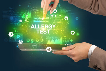 Close-up of a touchscreen with ALLERGY TEST inscription, medical concept