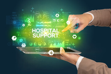 Obraz premium Close-up of a touchscreen with HOSPITAL SUPPORT inscription, medical concept