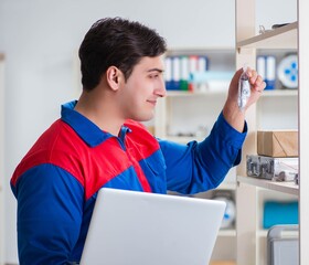 Man working in the postal warehouse