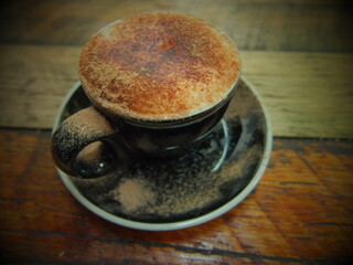 cup of coffee with chocolate dust