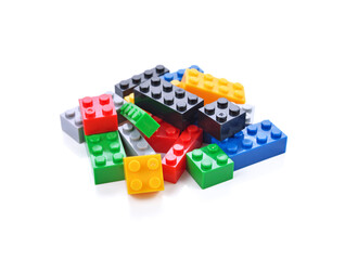 Plastic toy blocks on white background