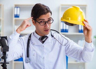 Safety doctor advising about wearing hard hat