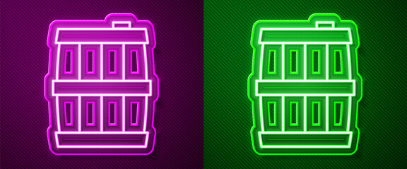 Glowing neon line Wooden barrel icon isolated on purple and green background. Alcohol barrel, drink container, wooden keg for beer, whiskey, wine. Vector.