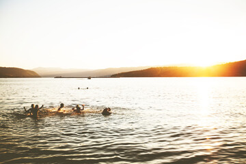 Summer Fun, Friends Enjoy Sunset On The Beach, Splashing In Water