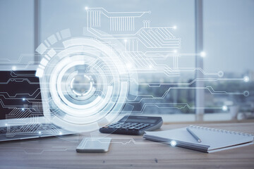 Double exposure of desktop computer and technology theme hologram. Concept of software development.