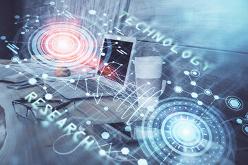 Double exposure of computer and technology theme hologram. Concept of freelance work.