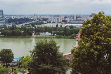 Fototapeta na wymiar New Bridge, Bratislava, Slovakia over the river on a cloudy day