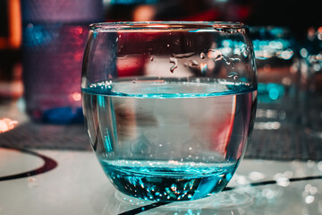 Close up shot of glass of water on the table