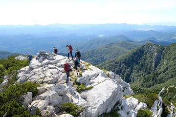 Silhouette of turists on trail in beautiful National Park Risnjak, Croatia © Iwona