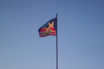 The flag of Belgrade on the blue sky