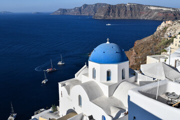 Fototapeta na wymiar Blue domes of Santorini in Greece