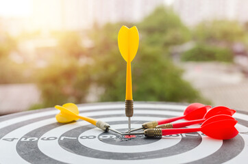Bullseye is a target of business concept. business marketing as concept.Dartboard is the target and...