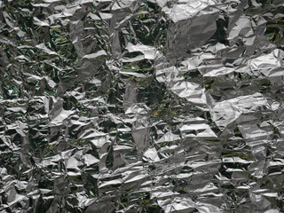 silver rough wrinkle foil texture. aluminium foil texture background. metal plate