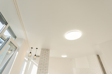 Beautiful built-in lamps in the stretch ceiling - obrazy, fototapety, plakaty